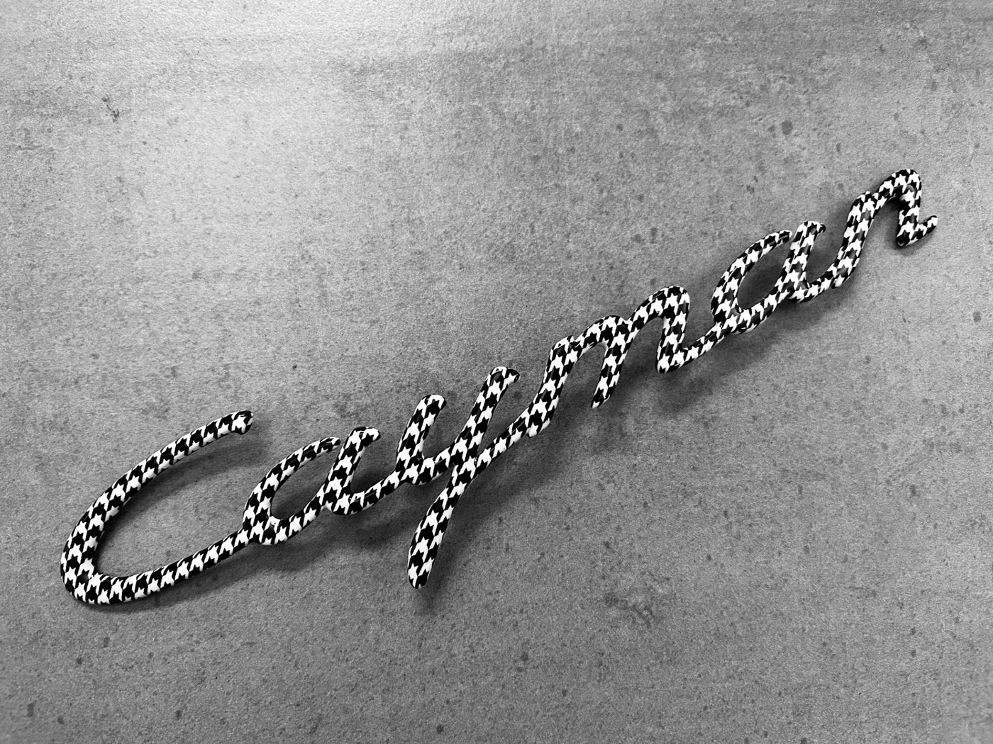 Porsche 987 Cayman Houndstooth Nameplate OEM